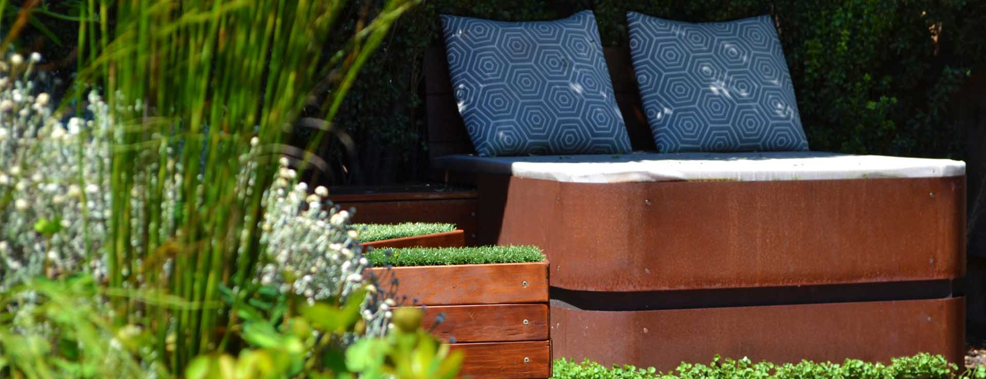 Contemporary backyard with daybed and seats